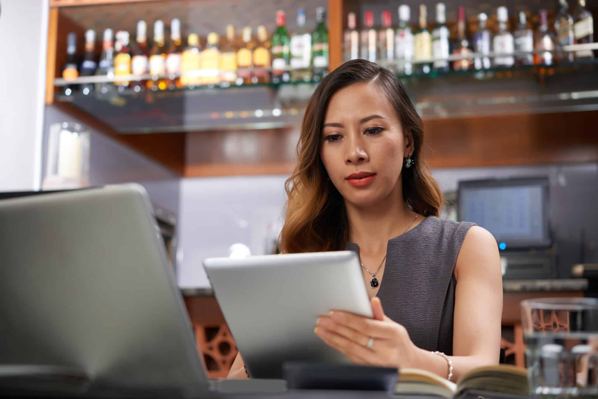 Restaurant owner checking numbers